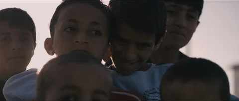 Syrian refugee children looking at the camera Video stock 104937754