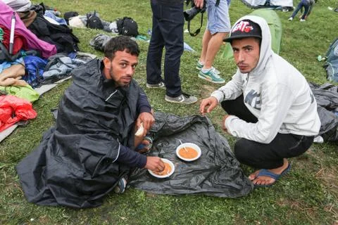 Syrian refugees at slovenian border Stock Photos