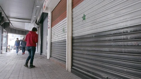 Syrian young man opens his shop at morning in Damascus, Syria Stock Footage 121872417