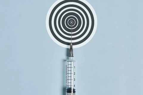 Syringe and aim Stock Photos
