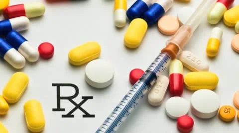 Syringe and pills Stock Footage 21309709