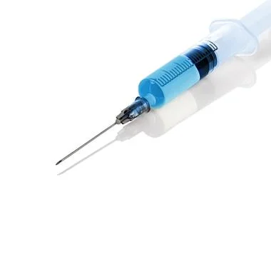 Syringe close-up isolated on a white background. Stock Photos