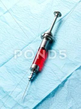 Syringe Containing Red Liquid