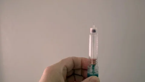 Syringe dosing_Not B&amp;W Stock Footage 71193678