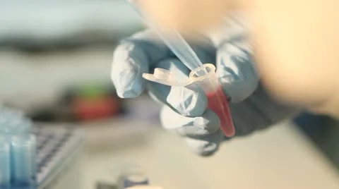 A syringe drawing red fluid Video stock 10679108