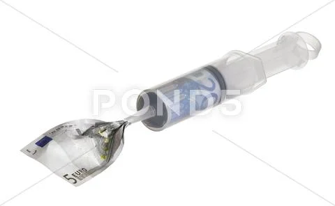 Syringe filled with money Stock Photos