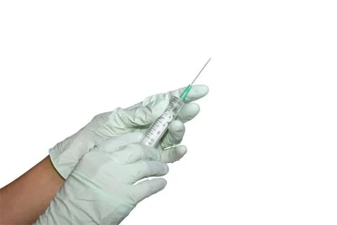 Syringe in hands Stock Photos
