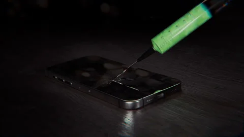 Syringe Injecting Green Malware Virus Into Smartphone Concept Video stock 334039964