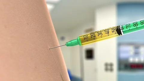 Syringe injecting liquid Stock Footage 117316745