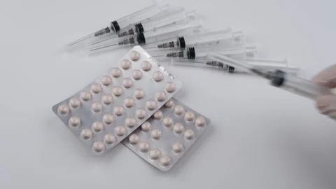 Syringe injector pills rotating Stock-Footage 243552637