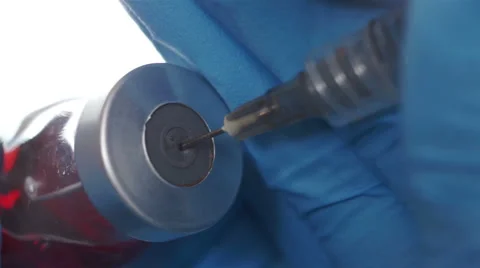 Syringe Insert Needle Bottle Macro Stock Footage 44184945