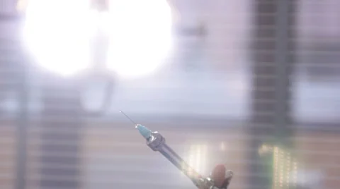 Syringe in the light Stock Footage 41384082