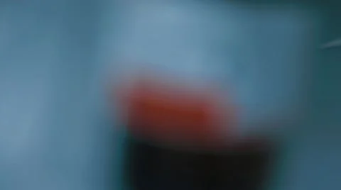 Syringe Is Lowered Into A Flask Stock Footage 64256723