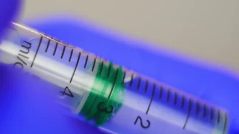 Syringe making injection. Close-up. Stock Footage 106861093