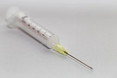 A syringe with a needle Stock Photos