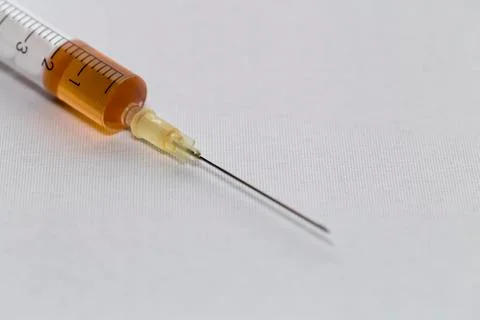 A syringe with a needle Stock Photos