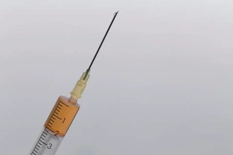 A syringe with a needle Stock Photos