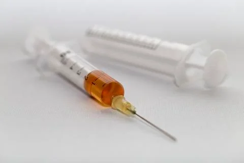 A syringe with a needle Stock Photos