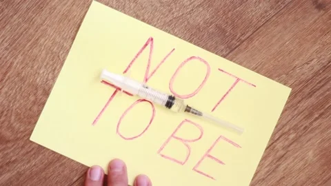 Syringe over memo NOT TO BE Stock Footage 157355300