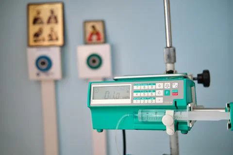 A syringe pump, a dropper for anesthesia and drug administration during opera Stock Photos