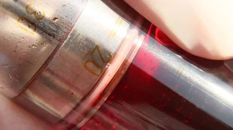 Syringe with red liquid Stock Footage 36960086