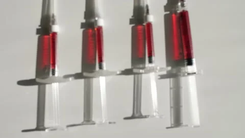 Syringe red liquid Stock Footage 137038901