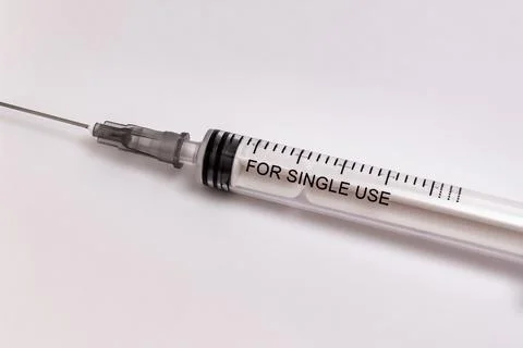 Syringe for single use on a white background Stock Photos