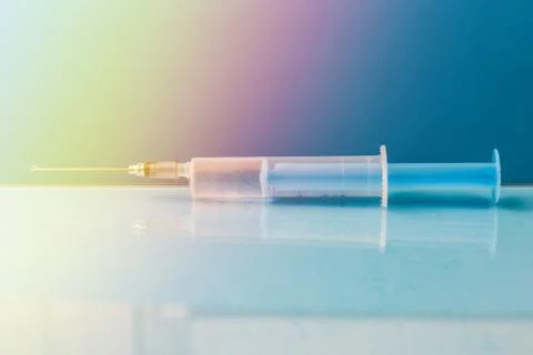 Syringe on the table Stock Photos