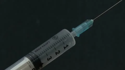 Syringe without  water  on a black background Stock Footage 10825509
