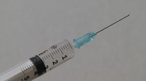 Syringe without  water  on a white background Stock Footage 10825512