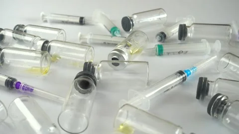 Syringes and ampoules on a white background. Stock-Footage 168653775