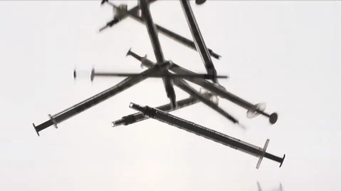A syringes are falling on a white table Stock-Footage 58770788