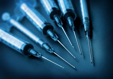 Syringes on black background Stock Photos