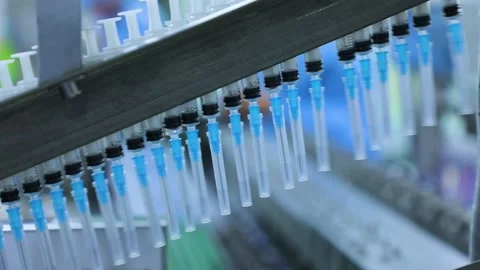 Syringes on a conveyor close-up Stock Footage 163088168