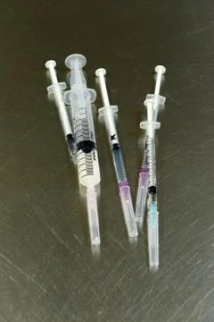 Syringes of different size Foto stock