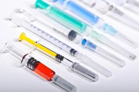 Syringes of different sizes Stock Photos