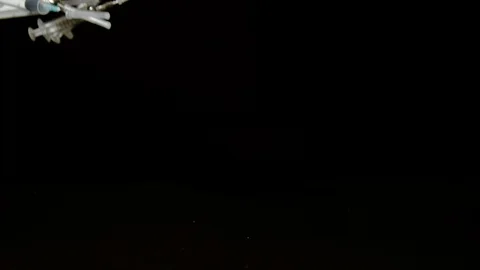 Syringes falling on black background, Ultra Slow Motion Stock Footage 86577103
