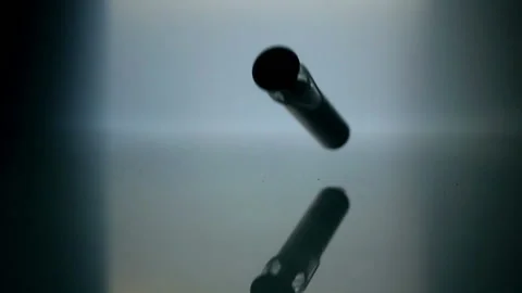 Syringes falling on blue background in slow motion. Prevention Immunization Stock Footage 171249459