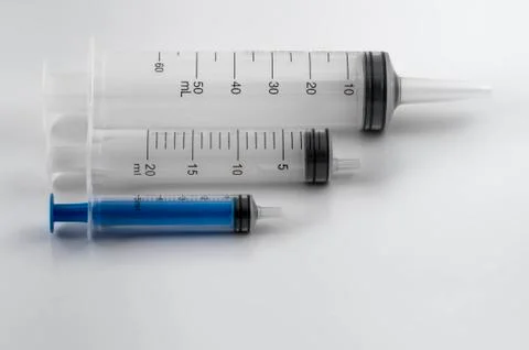 Syringes front linear 01 Stock Photos