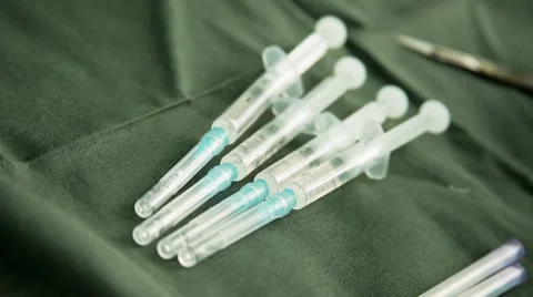 Syringes lie on the surgical table Stock Footage 55671869