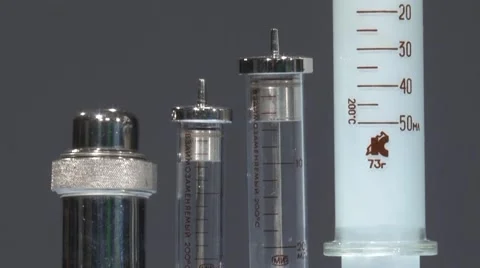 Syringes on the operating table. The case for the needles. Medical Stock Footage 55730658