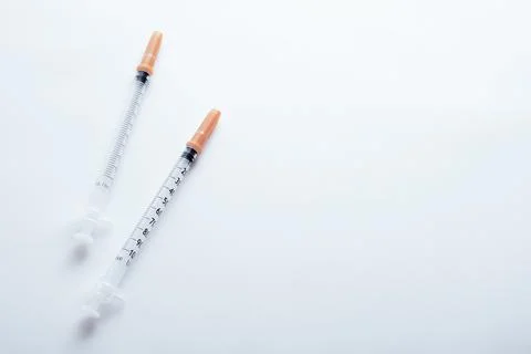 Syringes on white background Stock Photos