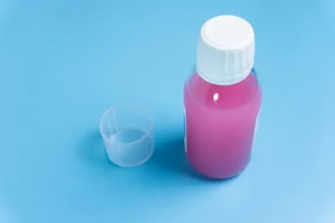 Syrup in a bottle Stock Photos