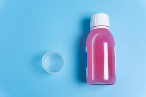 Syrup in a bottle Stock Photos