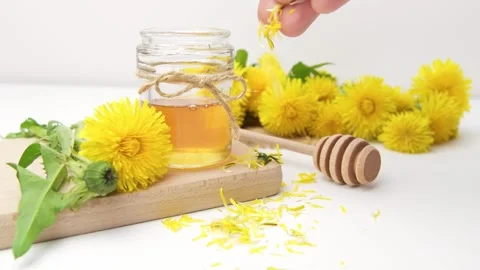 Syrup, dandelion honey, composition with fresh flowers Stock Footage 272230560