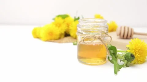 Syrup, dandelion honey, composition with fresh flowers Stock Footage 272230571