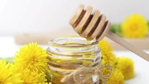 Syrup, dandelion honey, composition with fresh flowers Stock Footage 272230604