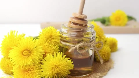 Syrup, dandelion honey, composition with fresh flowers Stock Footage 272230624