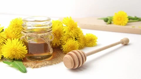 Syrup, dandelion honey, composition with fresh flowers Stock Footage 272230628