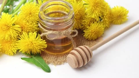 Syrup, dandelion honey, composition with fresh flowers Stock Footage 272230630